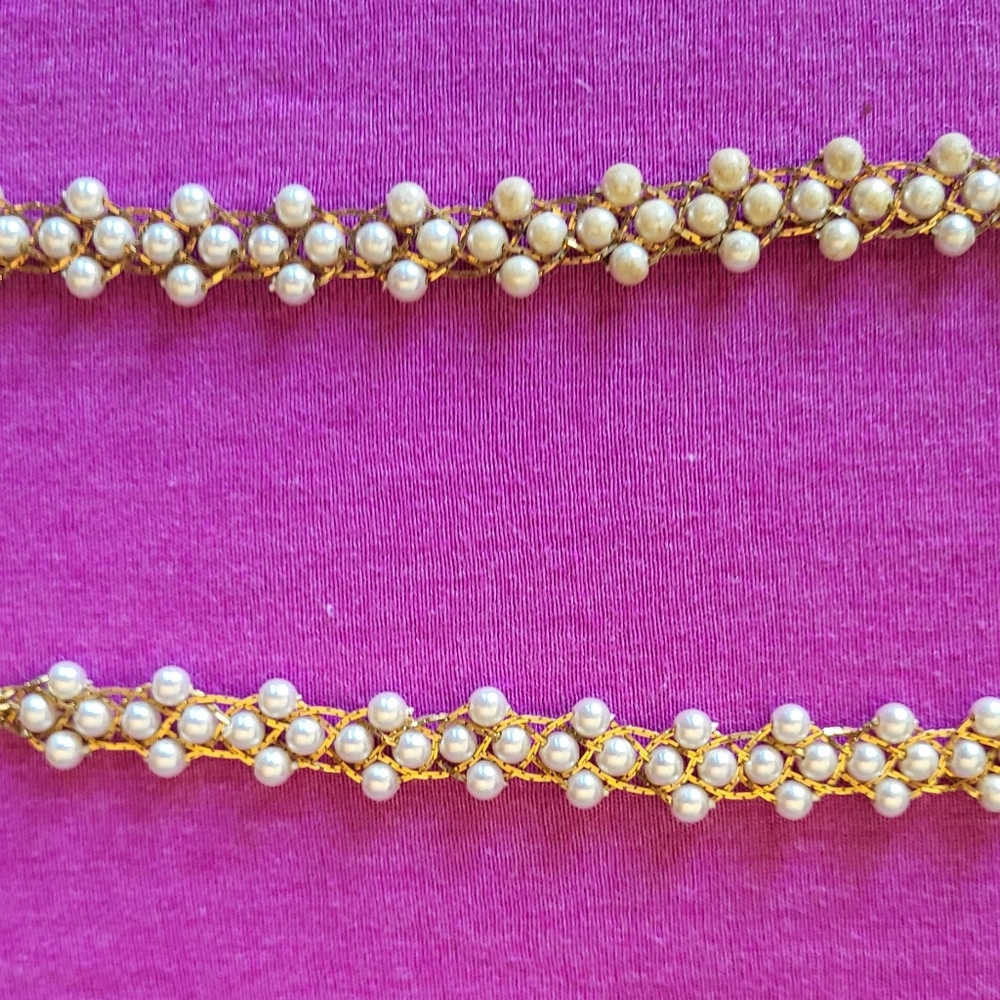Costume pearl and gold necklace